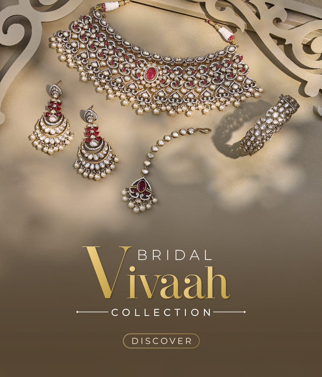 Alt: A woman adorned with intricate Kundan bridal jewellery set, including a necklace, earrings, and a maang tikka.