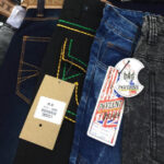 Georgio Peviani jeans detail, showcasing new fashion jeans top style with a focus on denim texture and brand label, exemplifying accessible streetwear trends.