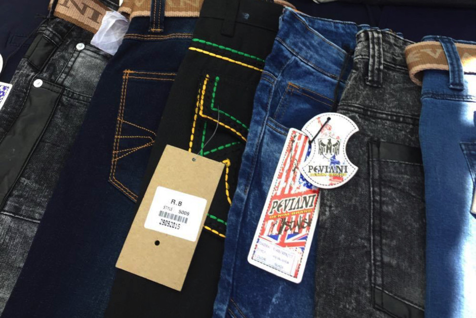 Georgio Peviani jeans detail, showcasing new fashion jeans top style with a focus on denim texture and brand label, exemplifying accessible streetwear trends.