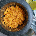 Bowl of Sri Lankan Coconut Sambol, a vibrant and flavorful dish, embodying sambal shree fashion in culinary arts.