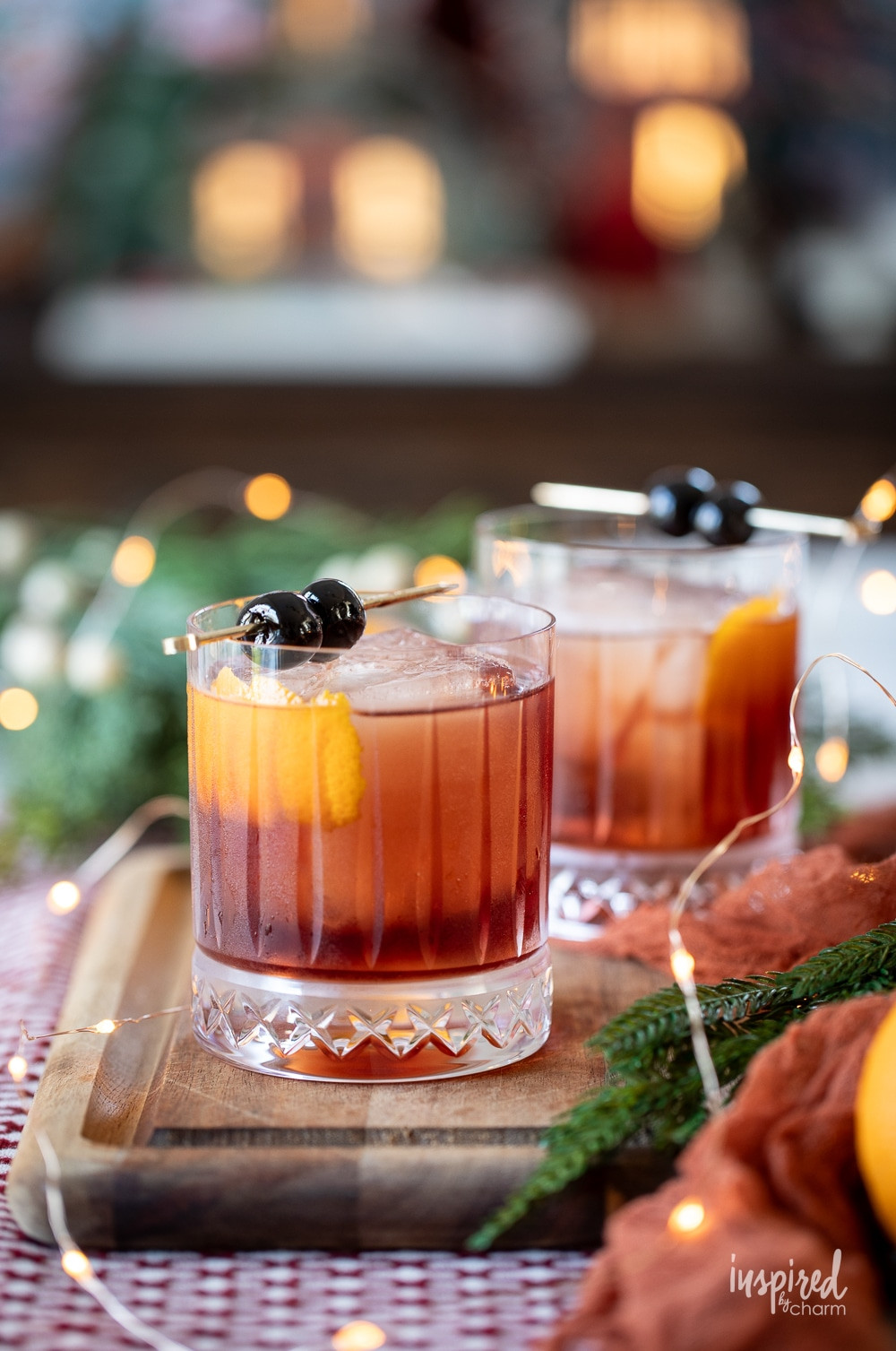 dolomite old fashioned cocktails served in glasses with festive decor.