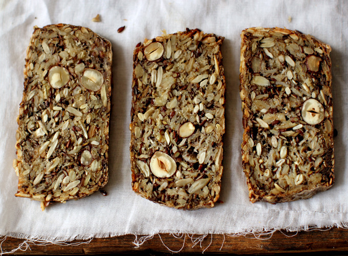 A loaf of bread with seeds and nuts.