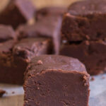 Fudge pieces on parchment paper.