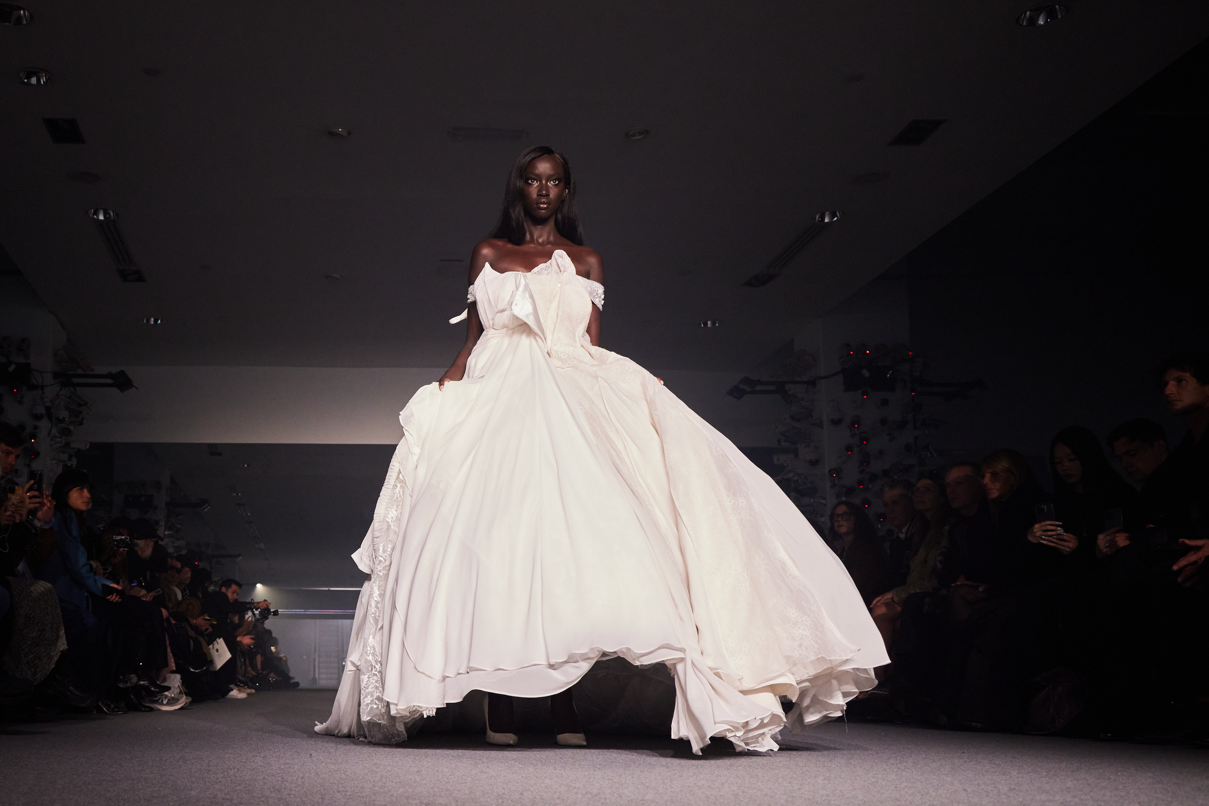 Anok Yai's unplanned runaway bride moment at Vetements Paris Fashion Week Spring/Summer 2025.