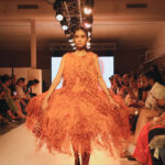 Students collaborating in a fashion design studio at IIAD Delhi