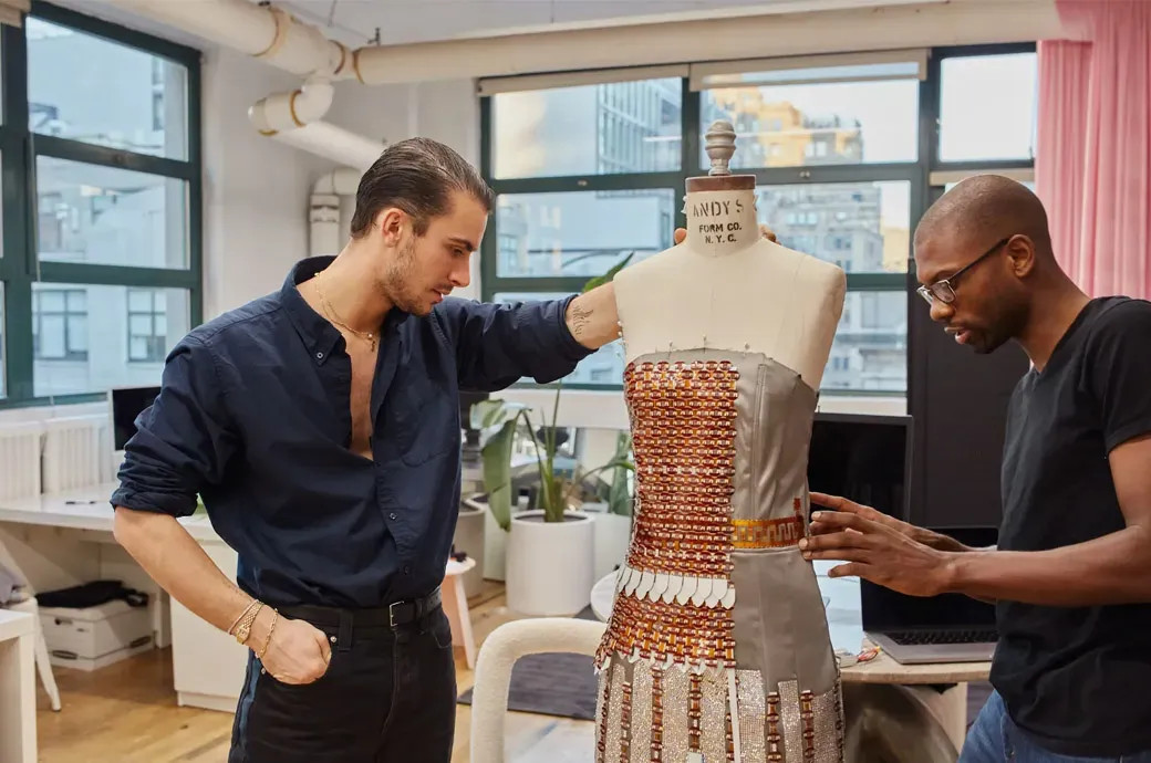 Fashion design students at NIFT Delhi collaborating on a project, showcasing teamwork and practical skills development in India's premier fashion college.