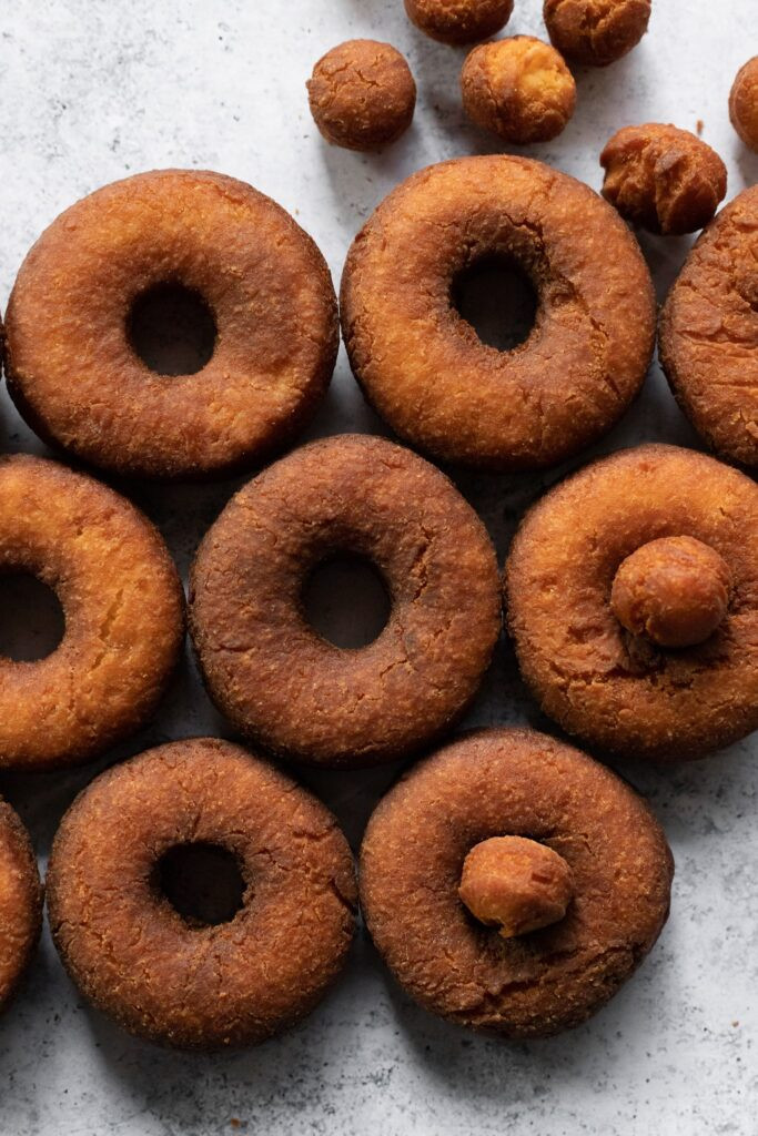 Close up of golden brown old fashioned donuts.