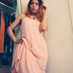 60's fashion style: Sandy from Last Night in Soho in a peach mini dress.