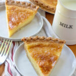 Buttermilk pie on a plate with a white and red napkin