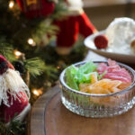 Old fashioned home made hard Christmas candy in a glass dish.