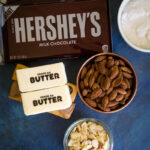 Ingredients to make English butter toffee on blue background