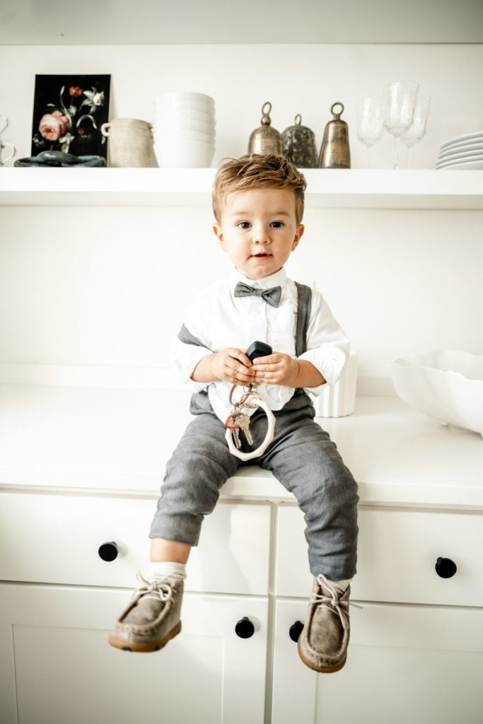 Toddler boy with a textured hairstyle and fade.