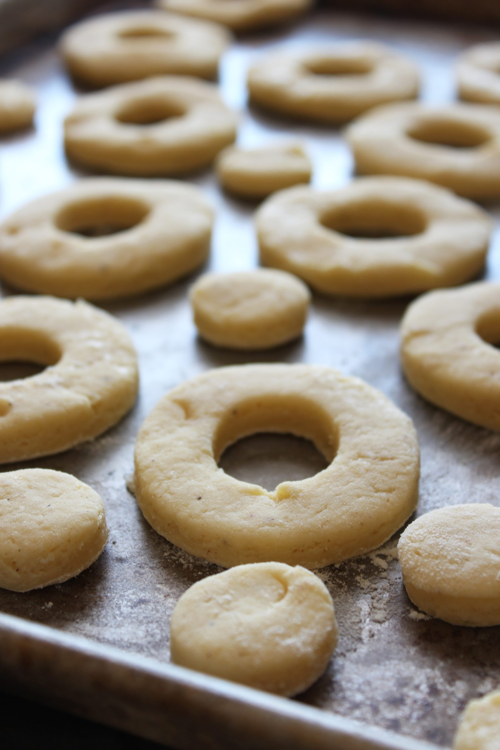 Unbaked sour cream donut dough, ready to be cut into shapes.