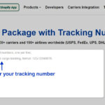 A person is holding a phone with the 17TRACK website open, displaying tracking information.