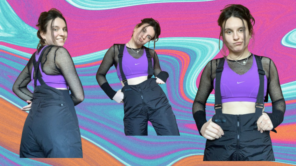 Urban ski realness featuring salopettes, a fishnet crop top, and a vibrant sports bra, exemplifying cyber fashion's blend of practicality and style.