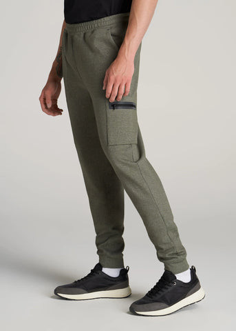 Closeup of man standing wearing utility joggers and sneakers