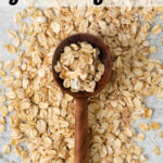 Overhead shot of oats with wooden spoon
