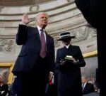 Man in a well-fitted suit.