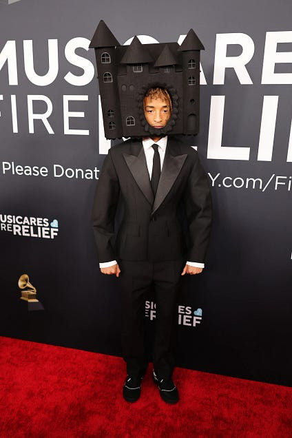 Jaden Smith Grammy fashions 2025 combining Abodi Transylvania House with Louis Vuitton suit, showcasing modern red carpet style.