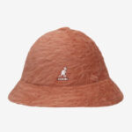 Kangol Hats in 90s hip hop fashion, capturing the essence of the era with its bold style and cultural influence.