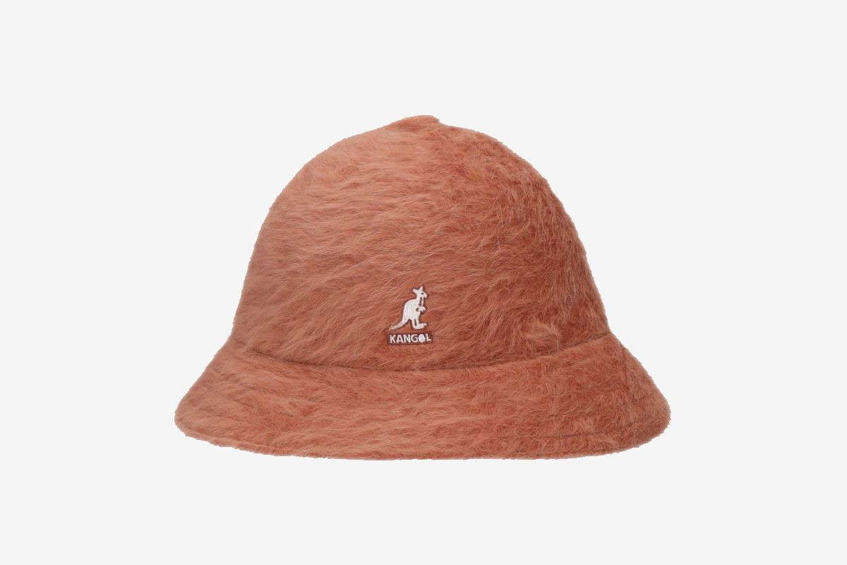Kangol Hats in 90s hip hop fashion, capturing the essence of the era with its bold style and cultural influence.