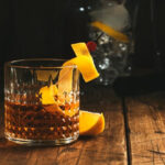 Sazerac cocktail with a lemon twist