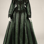 American Silk Dress, circa 1870, showcases the historical elegance that inspires Victorian Gothic fashion.