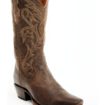 woman in jeans and western boots