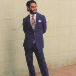 Man in a stylish suit with a patterned tie