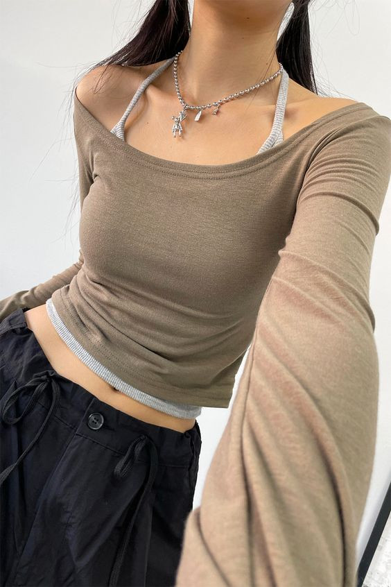 Another woman with minimal Acubi outfit