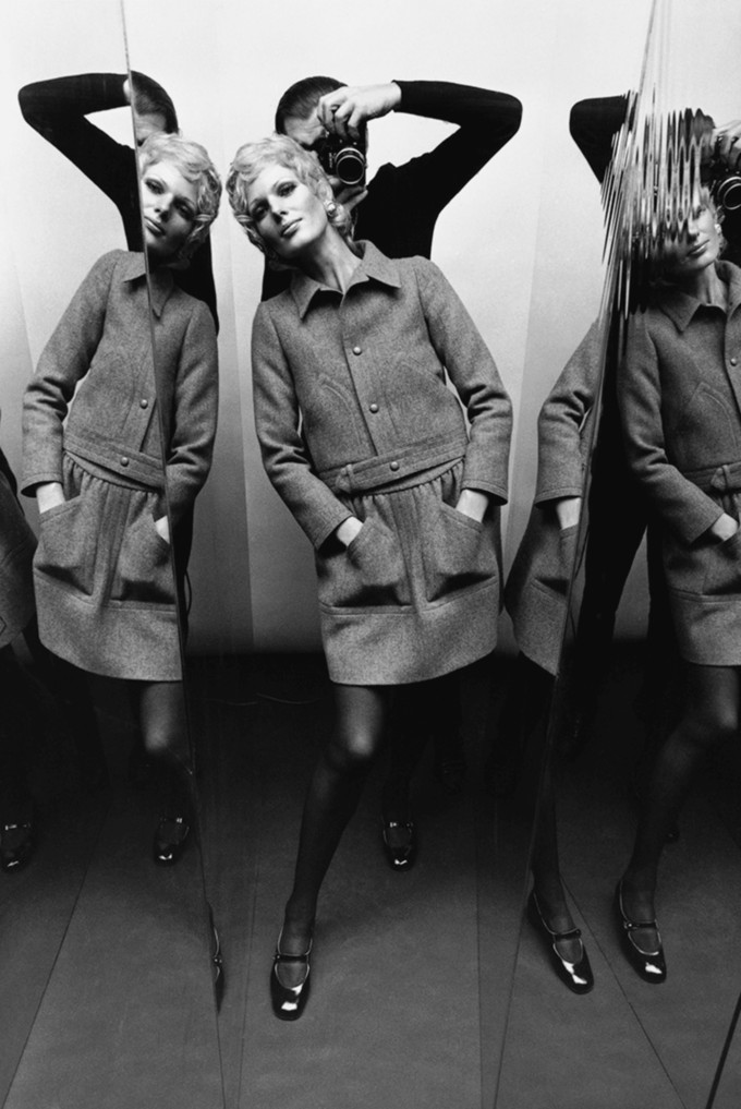 Elle by Helmut Newton, exemplifying his provocative black and white style and exploration of power dynamics