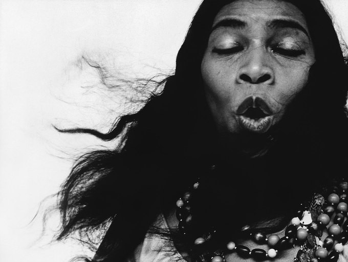 Marian Anderson, singer, in the role of Ulrica in "Un Ballo in Maschera" by Richard Avedon, showcasing his innovative approach to capturing models in dynamic, real-world environments