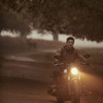 Mens biker fashion featuring a leather jacket and jeans