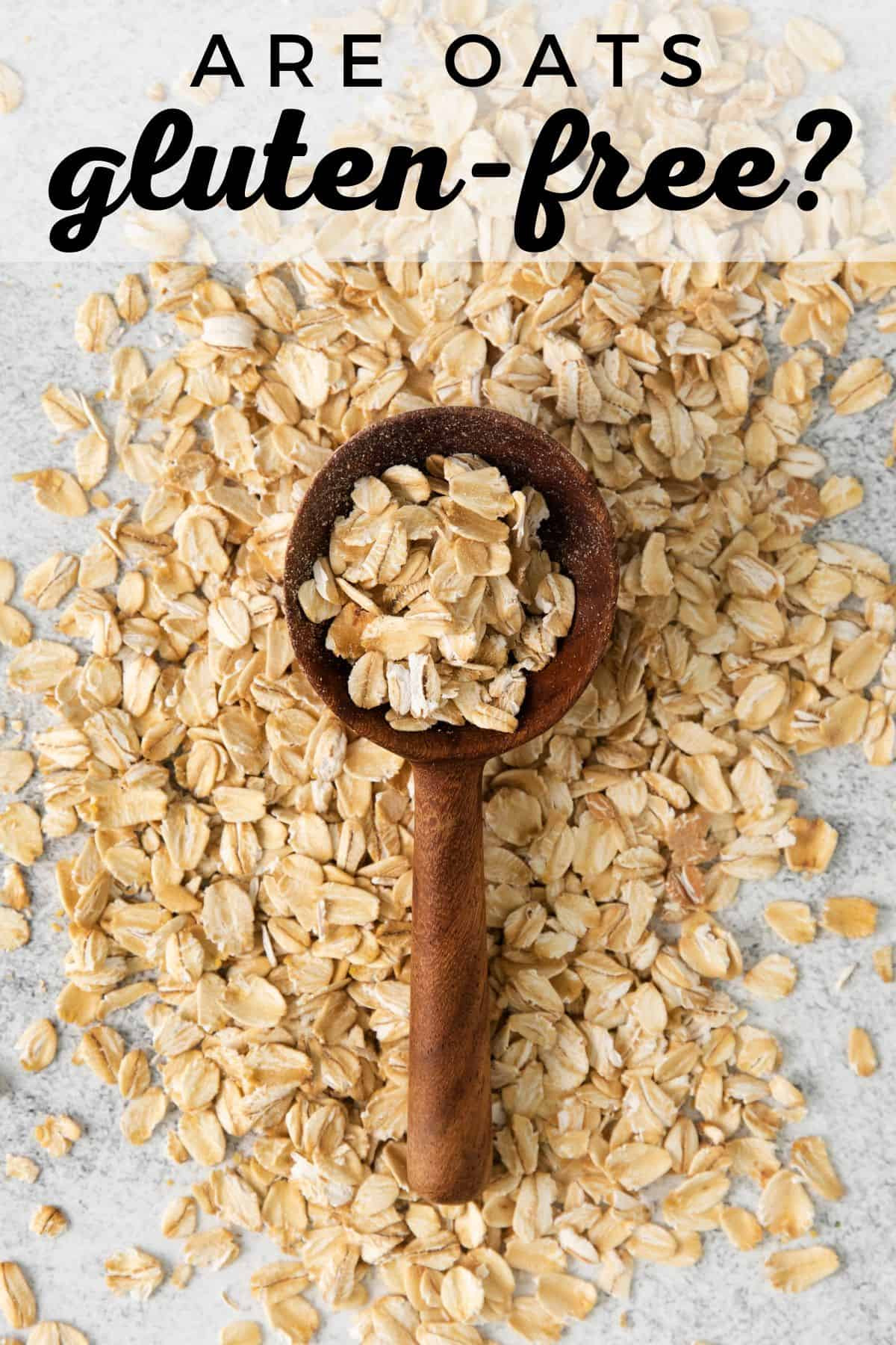 Overhead shot of oats with wooden spoon