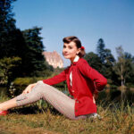 Audrey Hepburn's gamine haircut in a black and white photo, showcasing her stylish and sophisticated appearance
