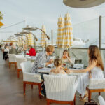 People enjoying outdoor dining at Fashion Island