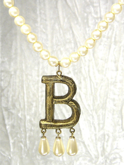 Betty's signature "B" necklace