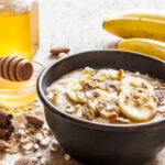 Bowl of organic old fashioned oats with berries and nuts