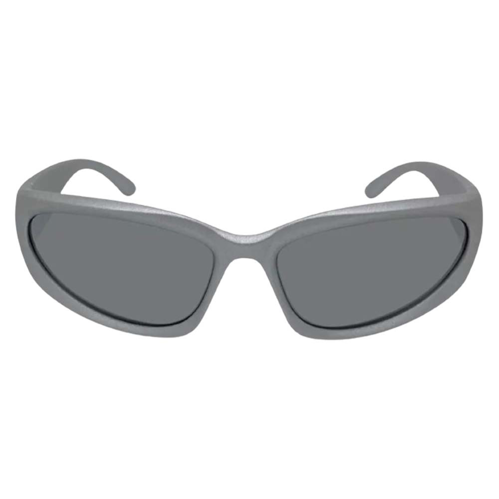 Model wearing black sunglasses for brat summer fashion