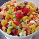 classic fruit salad in a white bowl, showcasing simplicity