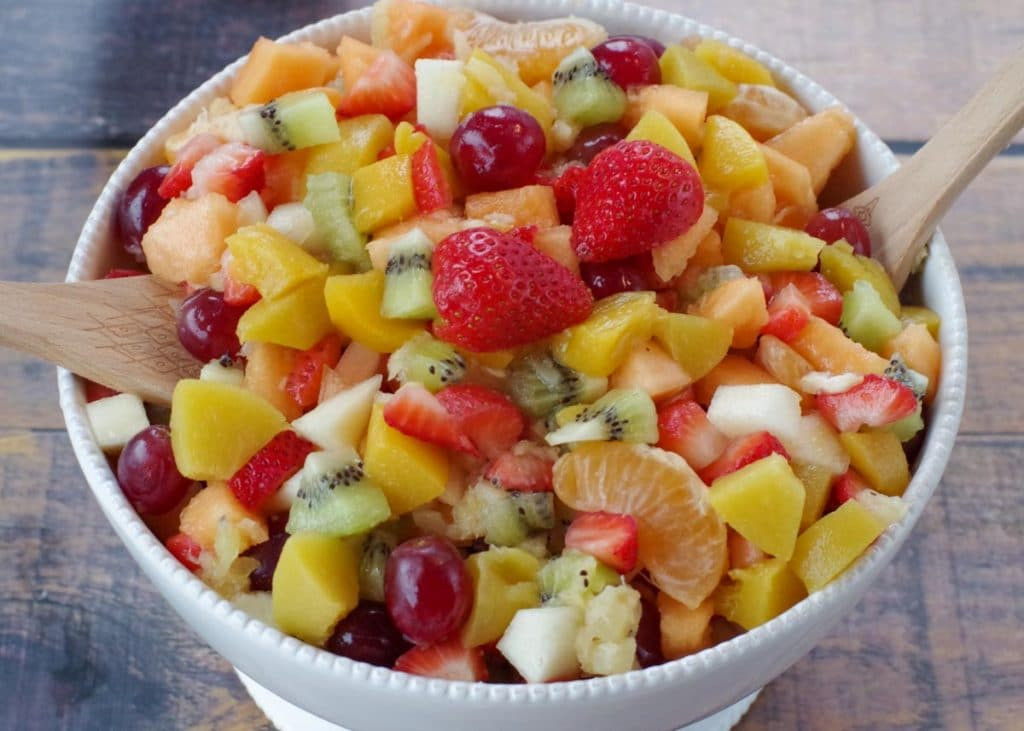 classic fruit salad in a white bowl, showcasing simplicity