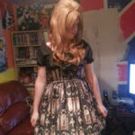 A Brolita pen pal of mine wearing Lolita fashion. The outfit is a dark color and well-coordinated, showing that males can partake in this fashion trend.