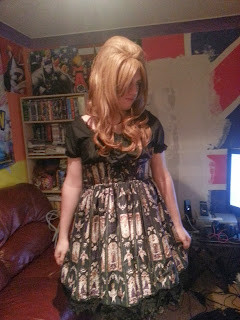 A Brolita pen pal of mine wearing Lolita fashion. The outfit is a dark color and well-coordinated, showing that males can partake in this fashion trend.