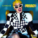 Cardi B in a Fran Fine-inspired outfit