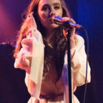 Chappell Roan performs live on stage at The Showbox on September 30, 2017 in Seattle, Washington, showcasing her early stage presence and style evolution.