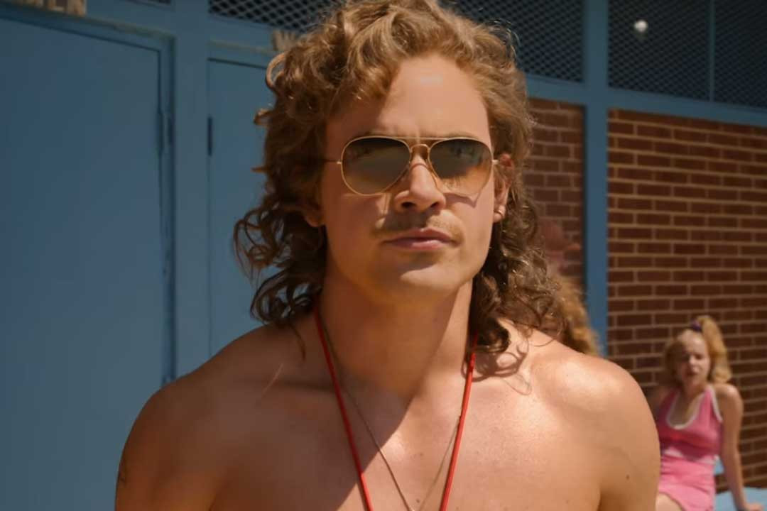 Character Billy Hargrove from Netflix series Stranger Things wearing gold wire Aviator sunglasses