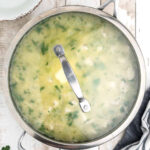 Chicken and rice prepared in a cooking pan.