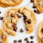 An assortment of old fashioned cookies displayed on a rustic wooden table, emphasizing their simple ingredients and homestyle appeal.