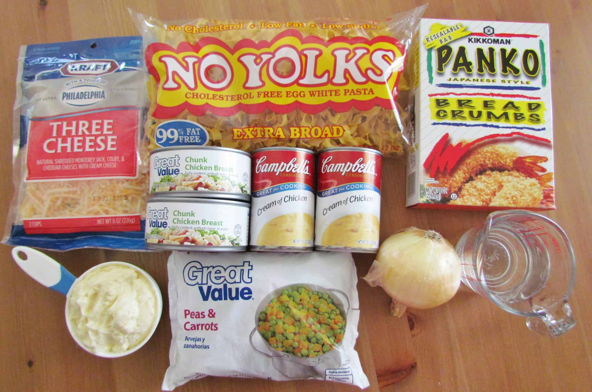 Essential Ingredients like chicken, cream of chicken soup, vegetables, cheese and noodles.