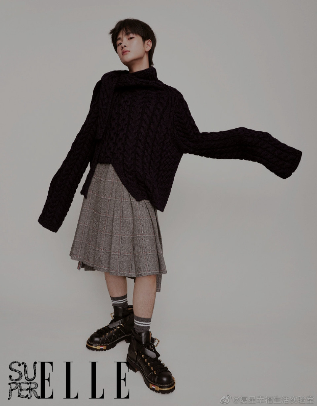 Zhou Zennan wearing a skirt for ELLE China, showcasing the influence of gender fluidity in Chinese men's fashion, a trend explored further on mens-fashion.net